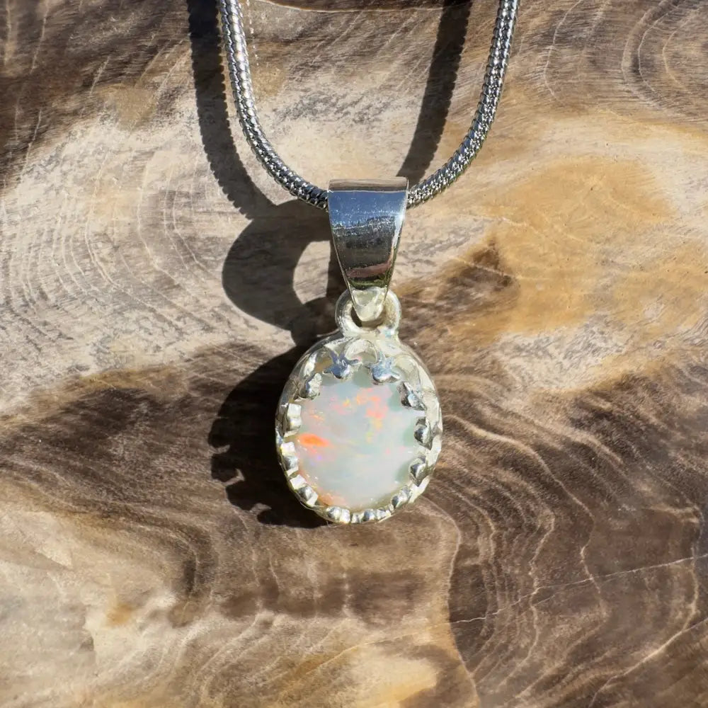 Silver opal pendant necklace.