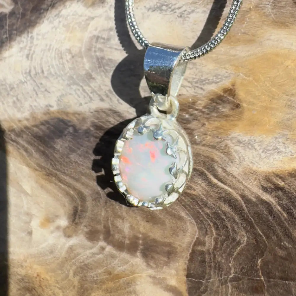 Silver opal pendant necklace.