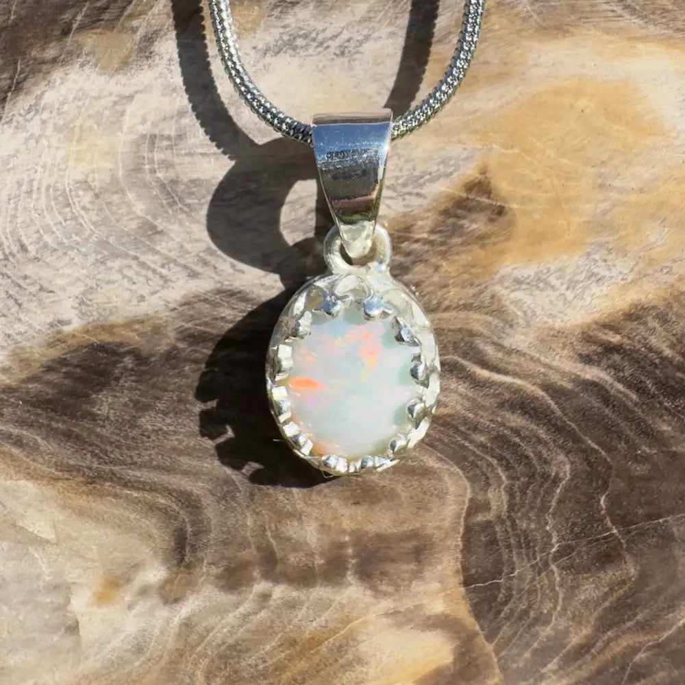 Silver opal pendant necklace.