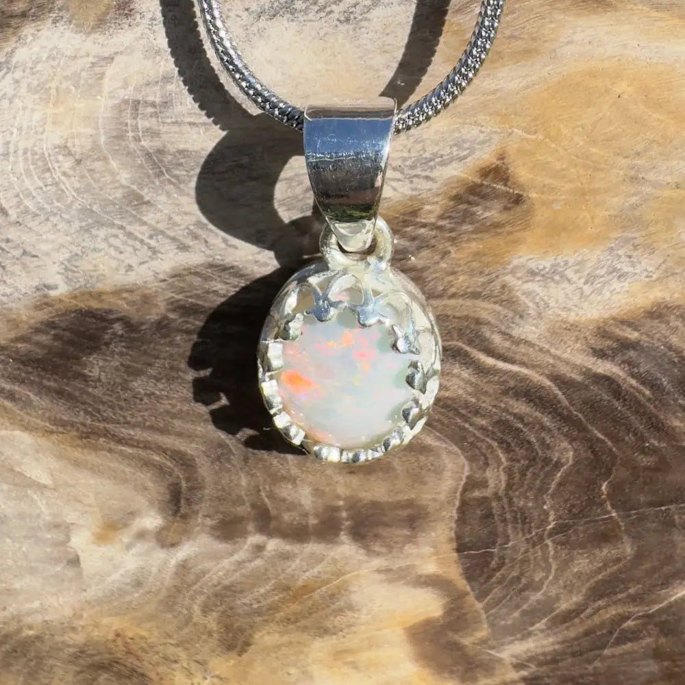 Silver opal pendant necklace.