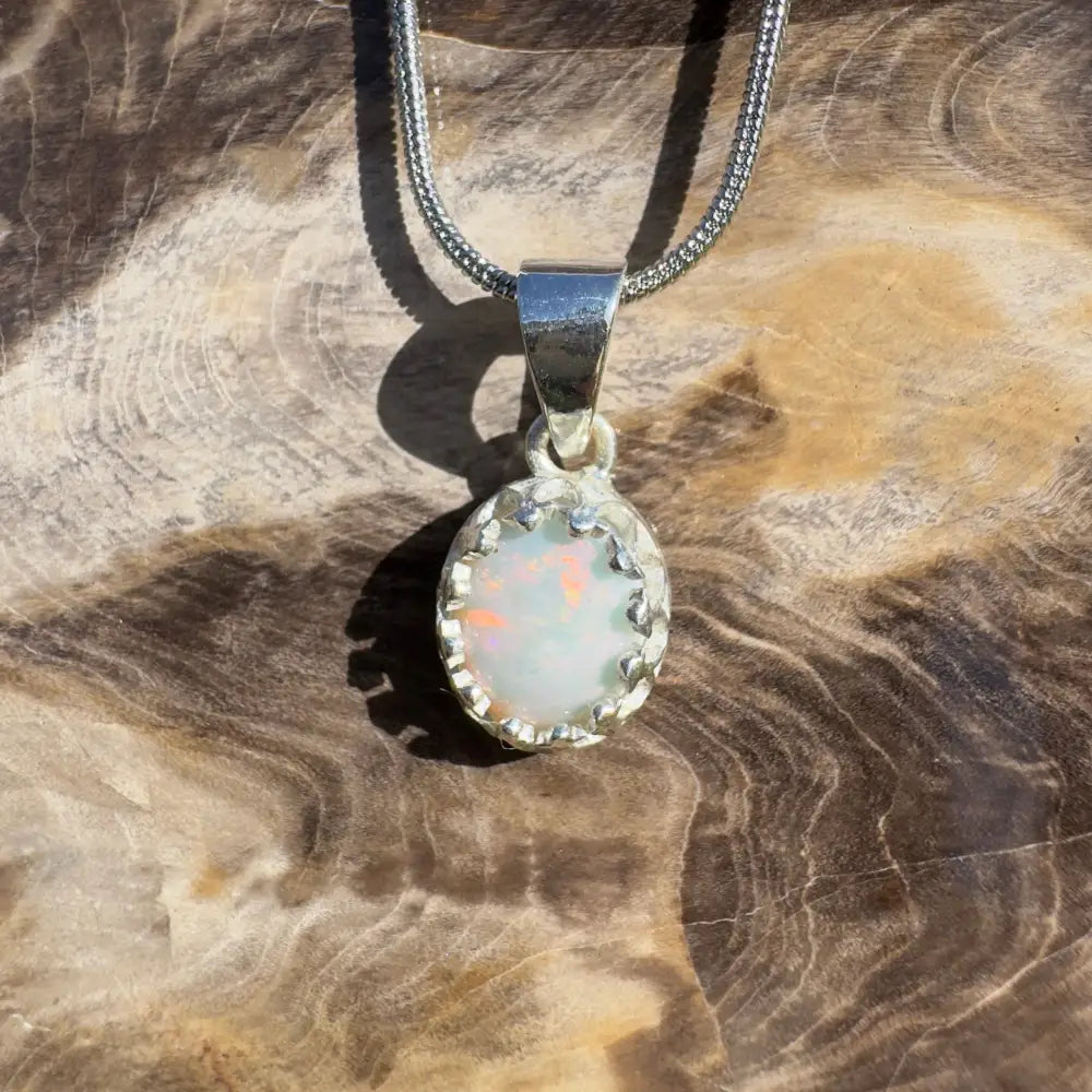 Silver opal pendant necklace.
