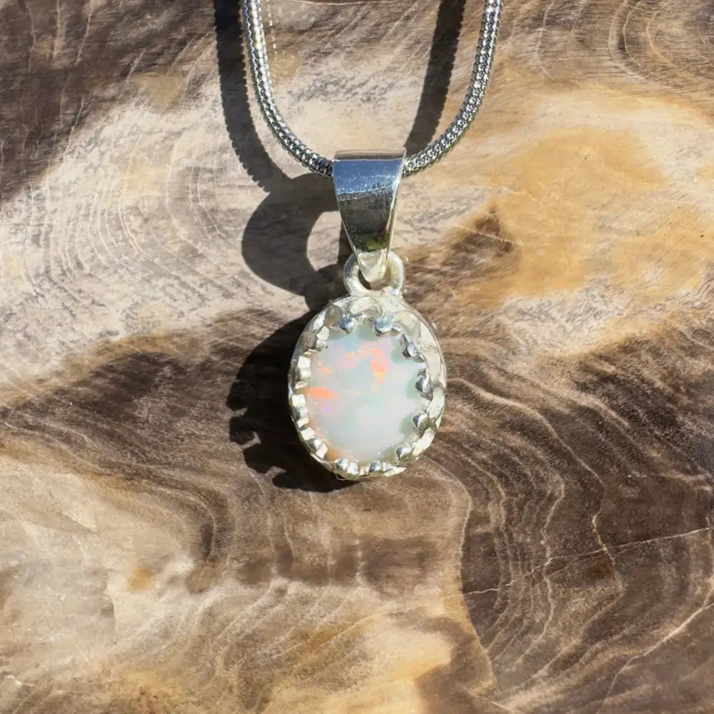 Silver opal pendant necklace.