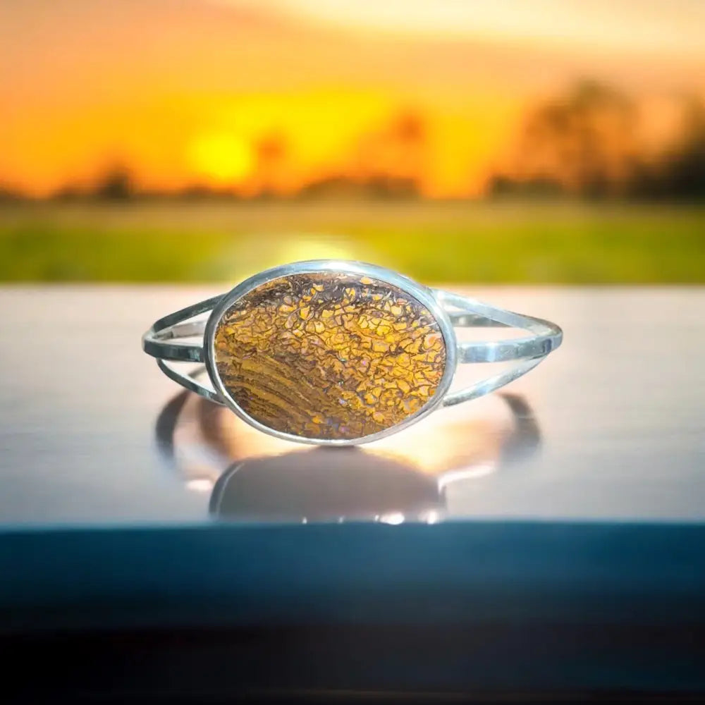 Silver bracelet with amber stone.
