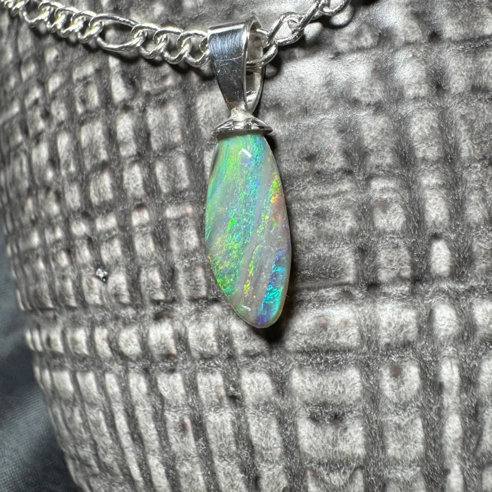 Eucalyptus Whisper handcrafted sterling silver pendant with a 2.1ct Lightning Ridge opal