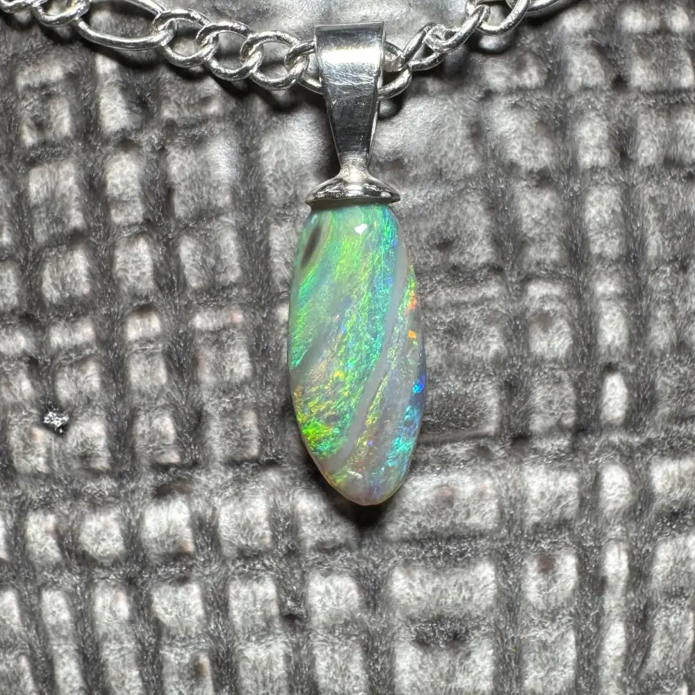 Iridescent opal pendant on silver chain from the Eucalyptus Whisper handcrafted jewelry collection