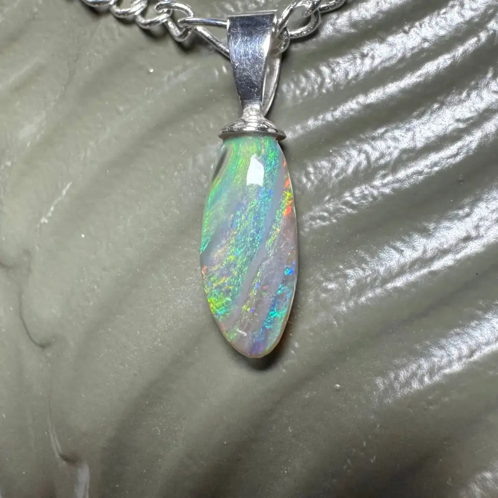 Iridescent opal pendant on silver chain from Eucalyptus Whisper handcrafted jewelry collection