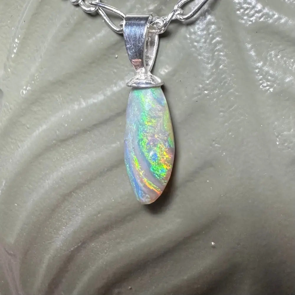 Opal pendant with silver chain featured in the Eucalyptus Whisper handcrafted sterling silver jewelry
