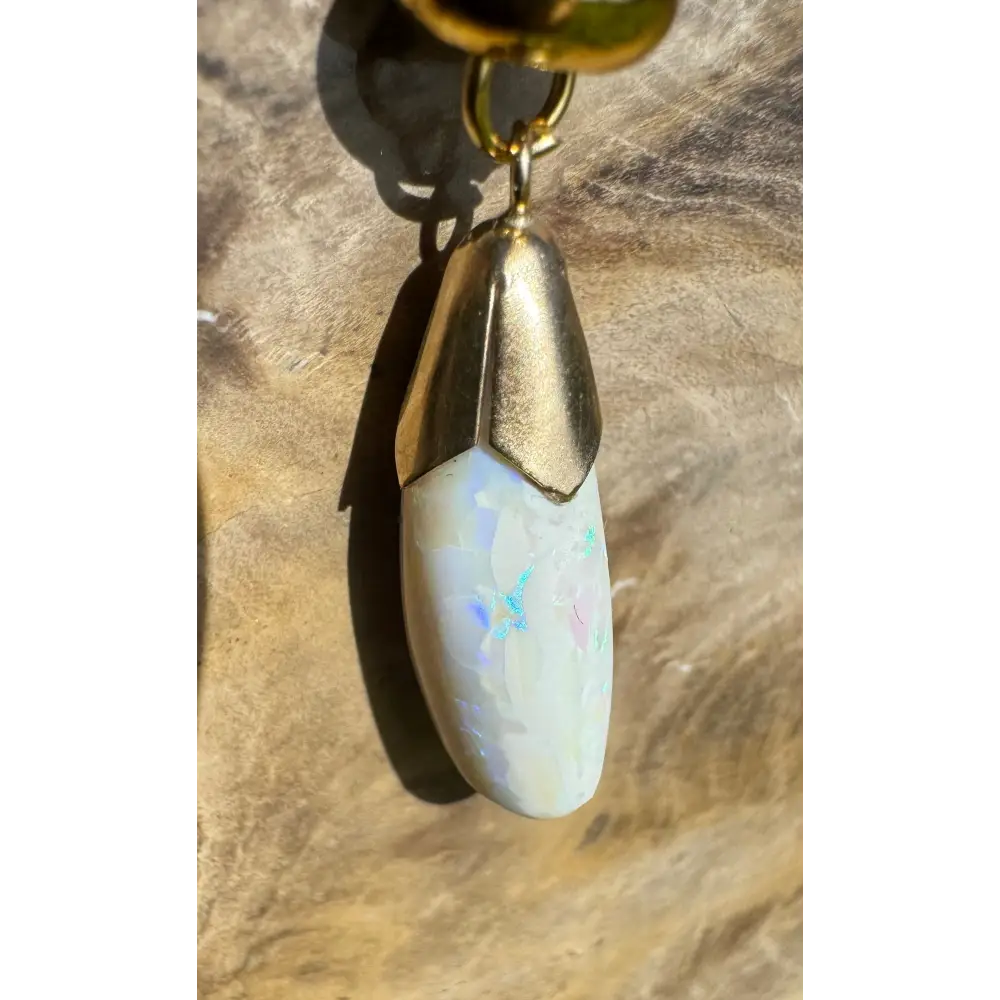 Gold-capped opal pendant featured in the Golden Horizons handcrafted 9ct solid gold jewelry