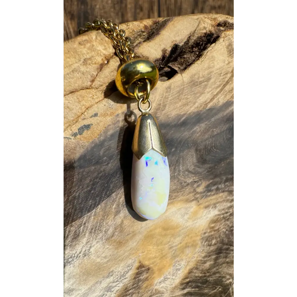Gold-trimmed Lightning Ridge White Opal pendant necklace crafted in 9ct solid gold