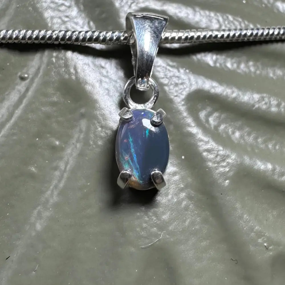 Silver pendant with iridescent Lightning Ridge opal in handcrafted 925 sterling silver jewelry