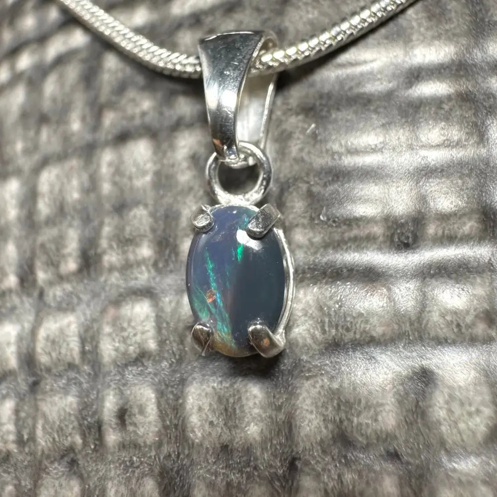 Silver pendant featuring a 0.6ct oval Lightning Ridge Opal from Great Barrier Radiance collection