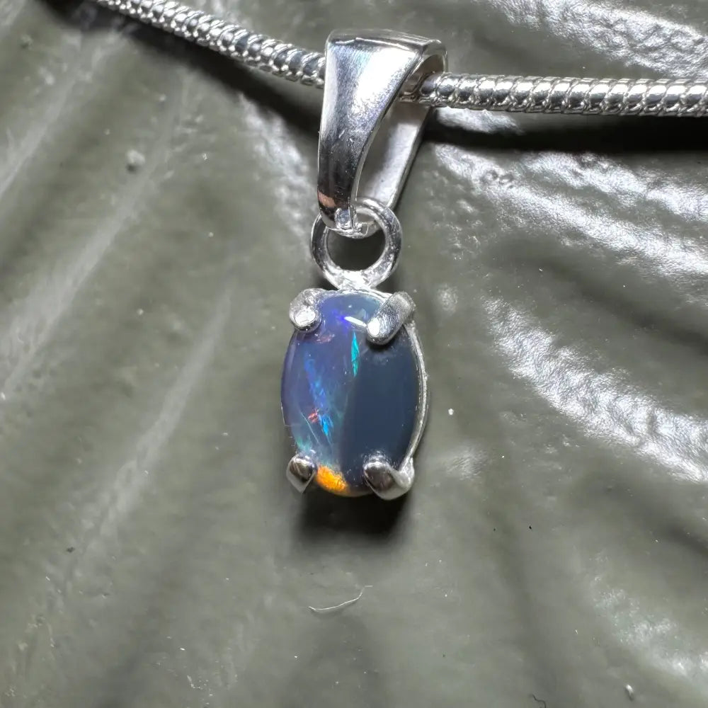 Silver pendant featuring an oval Lightning Ridge opal from the Great Barrier Radiance collection