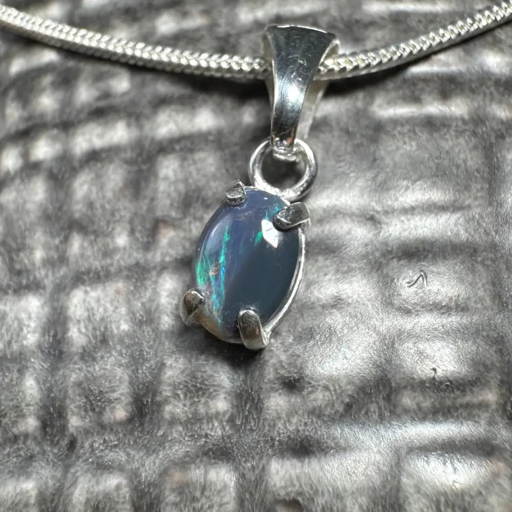 Silver pendant with iridescent Lightning Ridge Opal for the Great Barrier Radiance jewelry collection