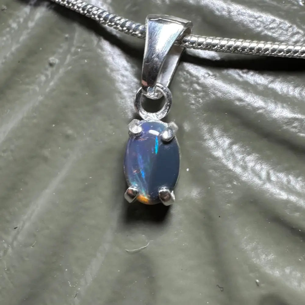 Opal pendant necklace from Great Barrier Radiance with handcrafted Lightning Ridge opal in sterling silver