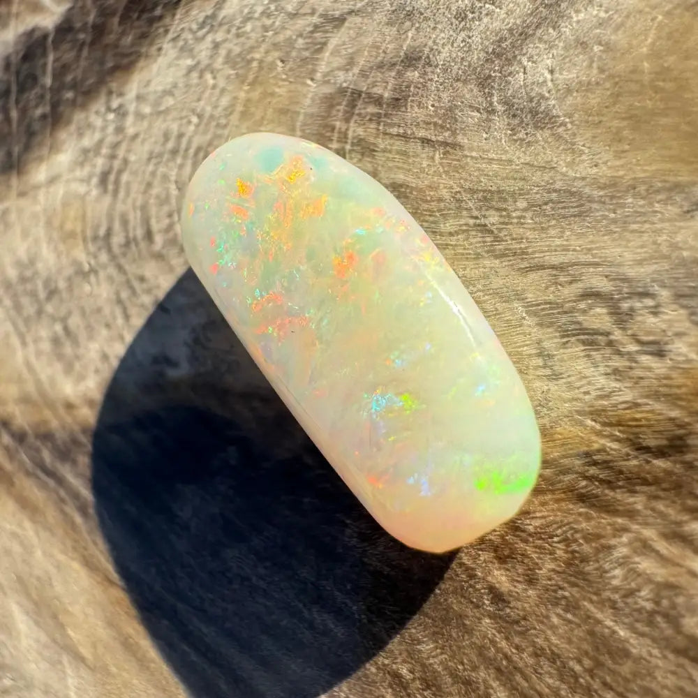 Iridescent white opal cabochon from Hand-Cut Solid Coober Pedy Opal 2.9 carat