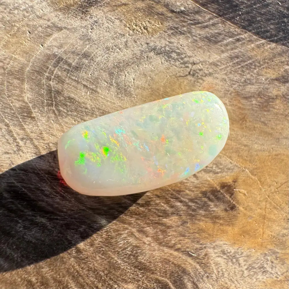 Iridescent white opal cabochon from the Hand-Cut Solid Coober Pedy Opal 2.9carat product
