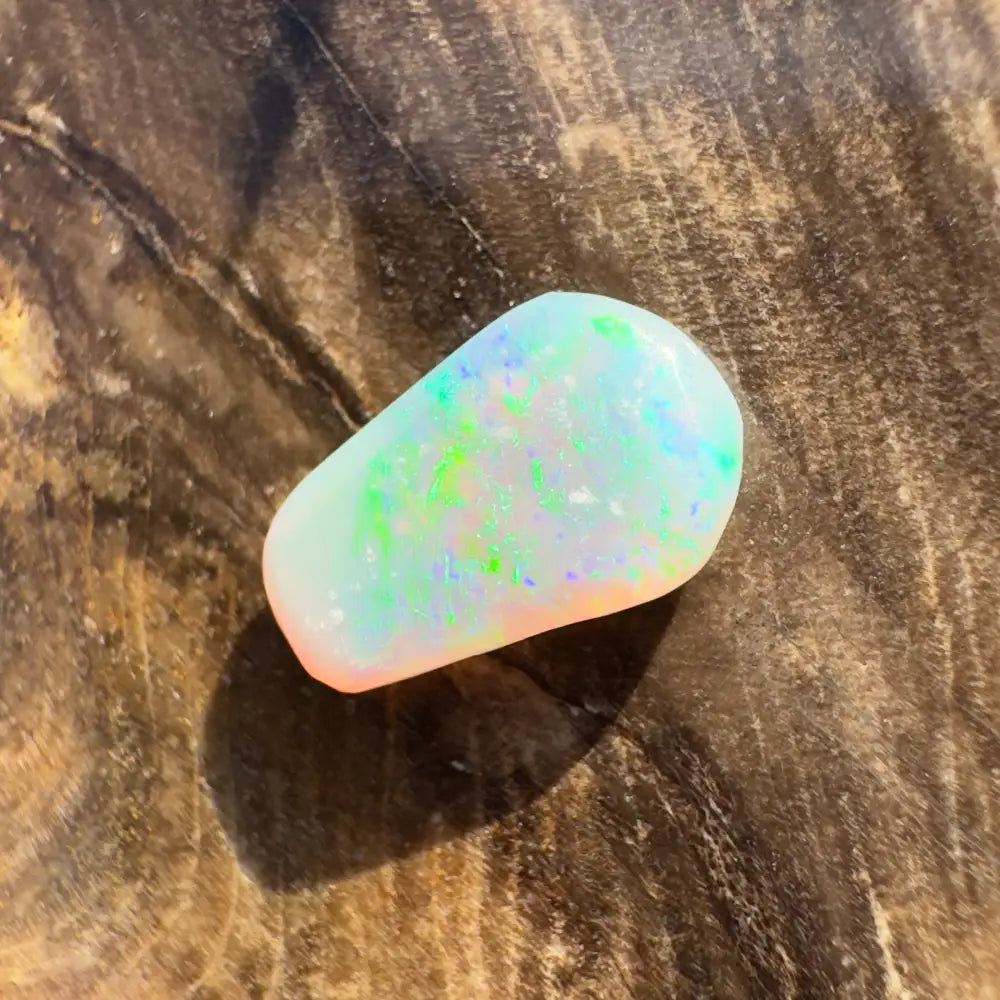 Polished Lightning Ridge Crystal Opal 1.0carat with vibrant color play and intricate pattern