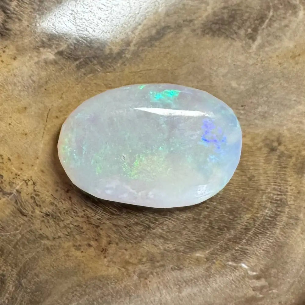 Iridescent white opal cabochon from Hand-Cut Solid Lightning Ridge Opal 1.2 carats