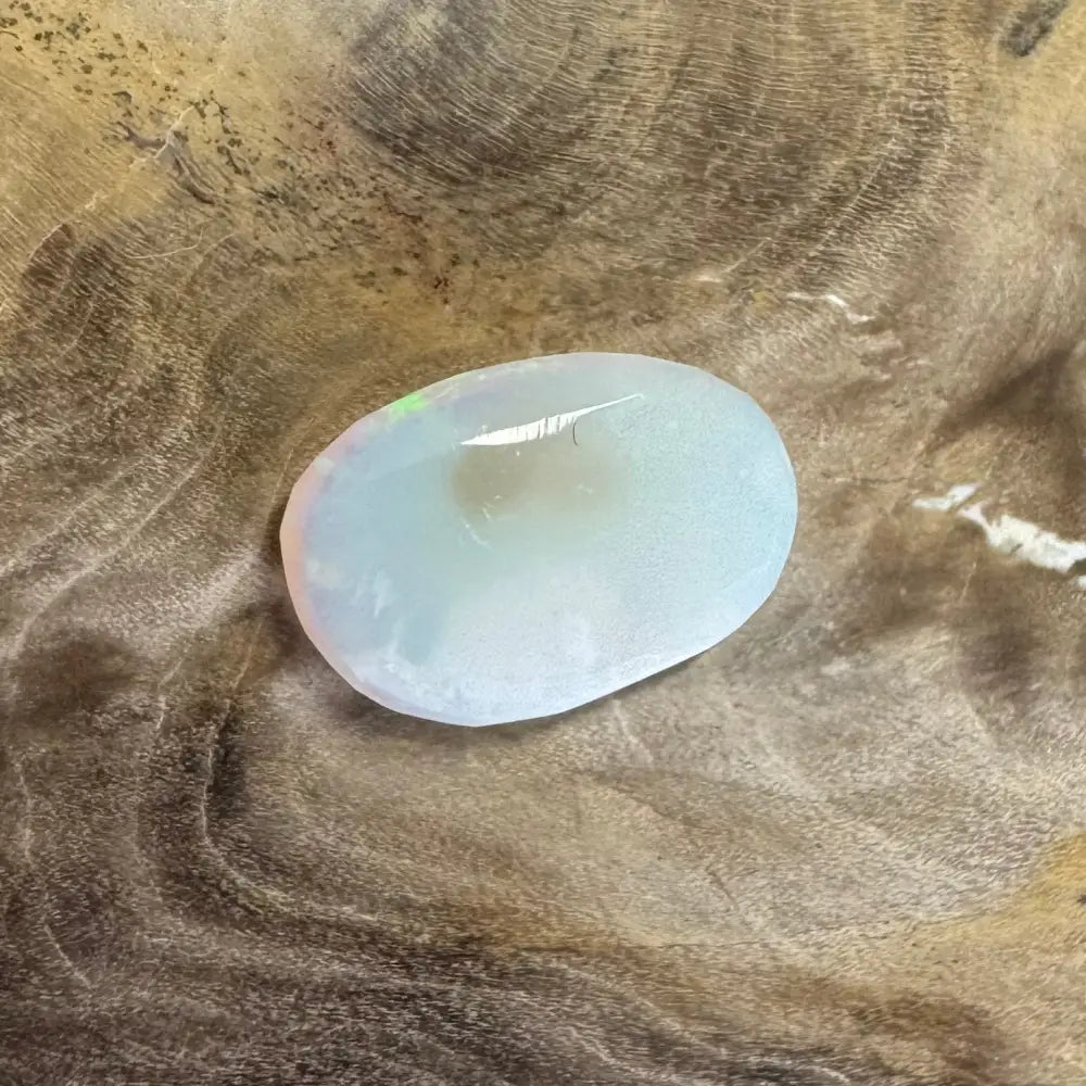 Translucent white Opal cabochon from Lightning Ridge in a 1.2carat Hand-Cut Solid Opal product