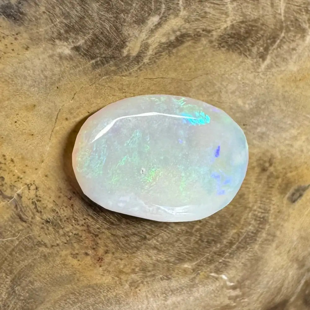 Iridescent white opal cabochon from Hand-Cut Solid Lightning Ridge Opal 1.2 carats