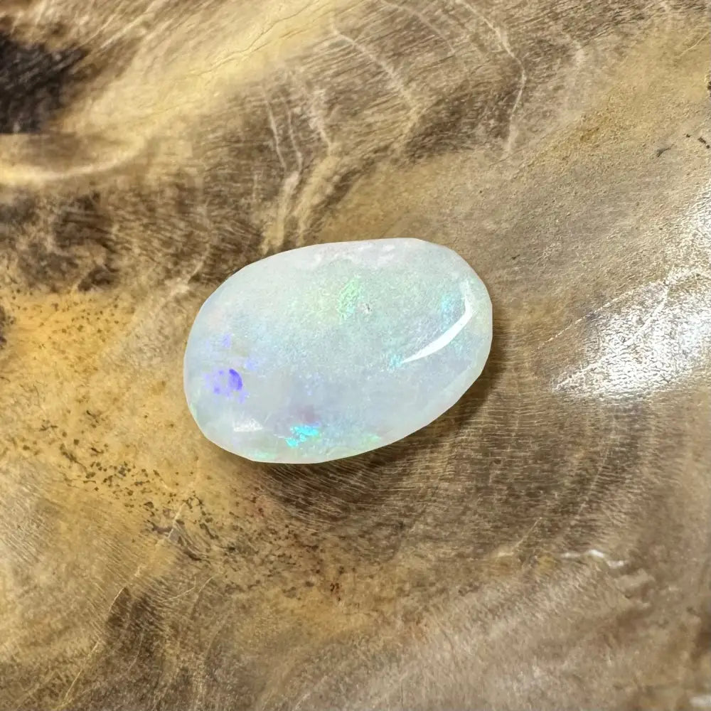 Iridescent white opal cabochon from Hand-Cut Solid Lightning Ridge Opal 1.2 carats