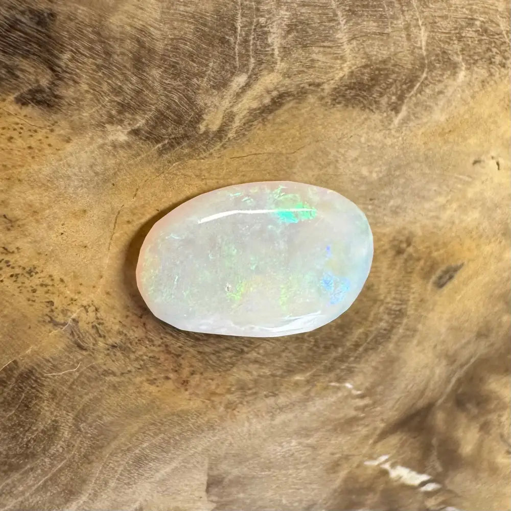 Iridescent white opal cabochon from Hand-Cut Solid Lightning Ridge Opal 1.2carat