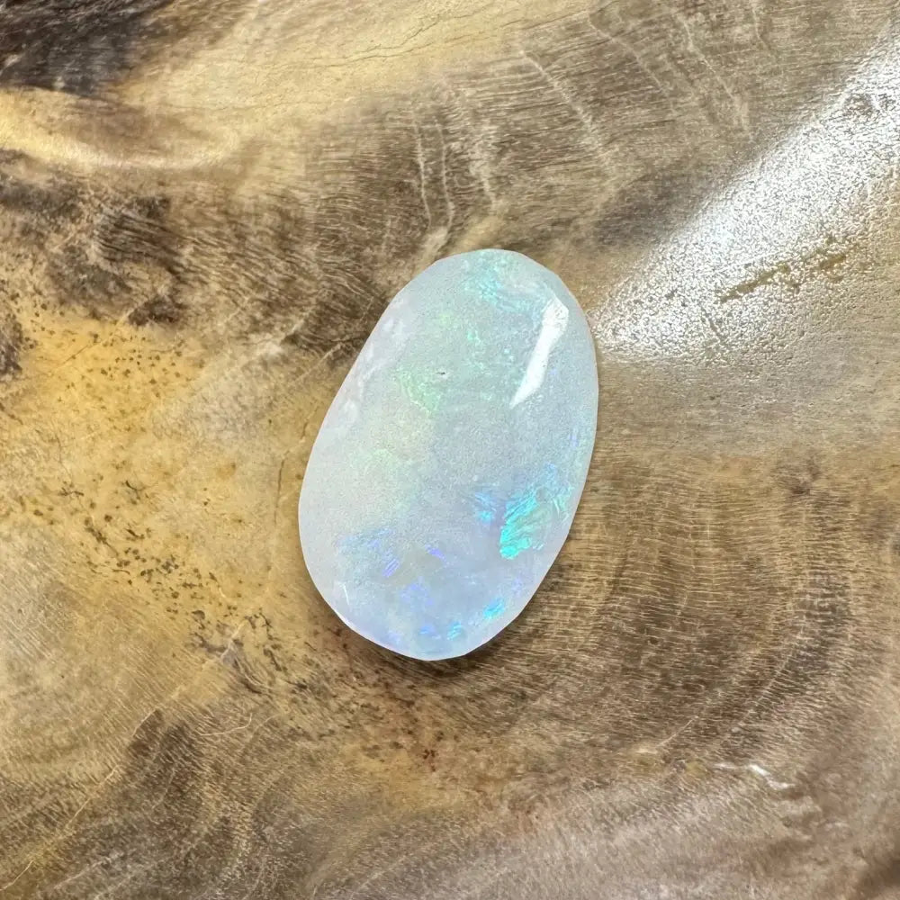 Iridescent white opal gemstone in Hand-Cut Solid Lightning Ridge Opal 1.2 carat jewelry