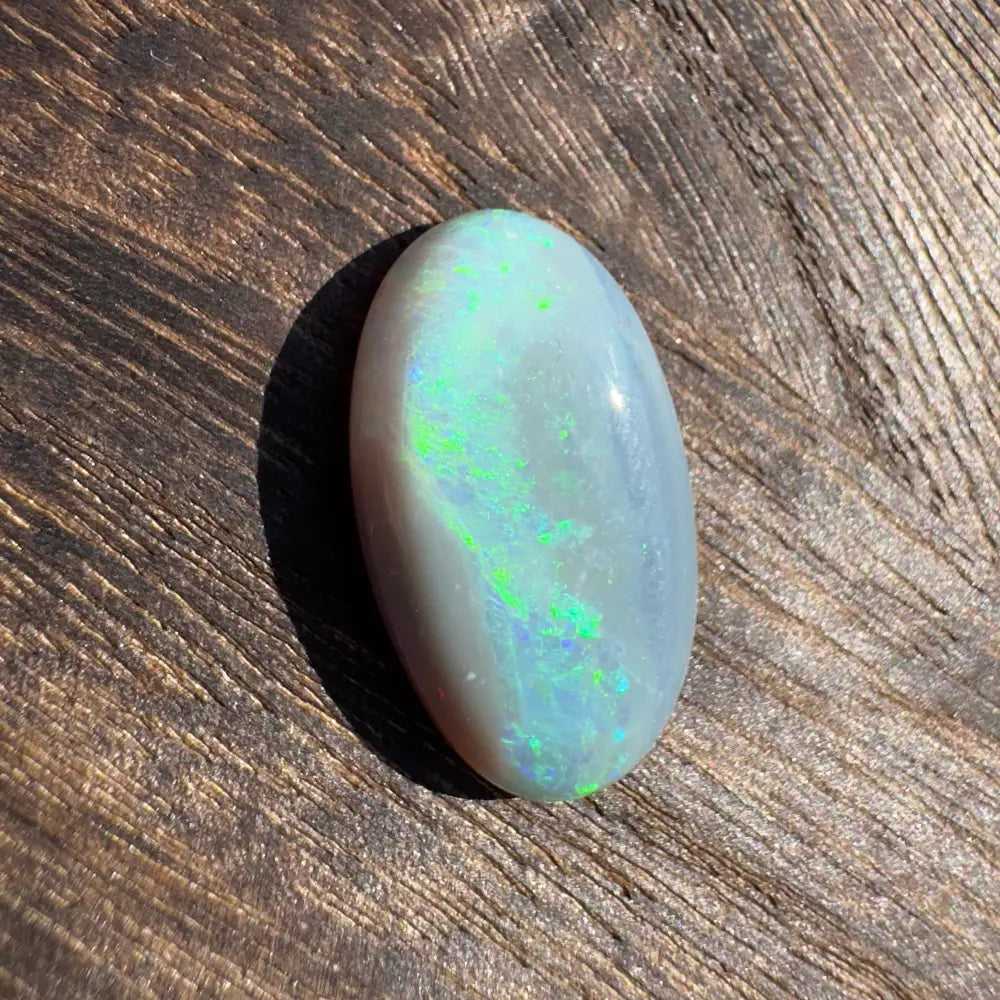 Iridescent oval opal cabochon from Hand-Cut Solid Lightning Ridge Opal 11.6 carats