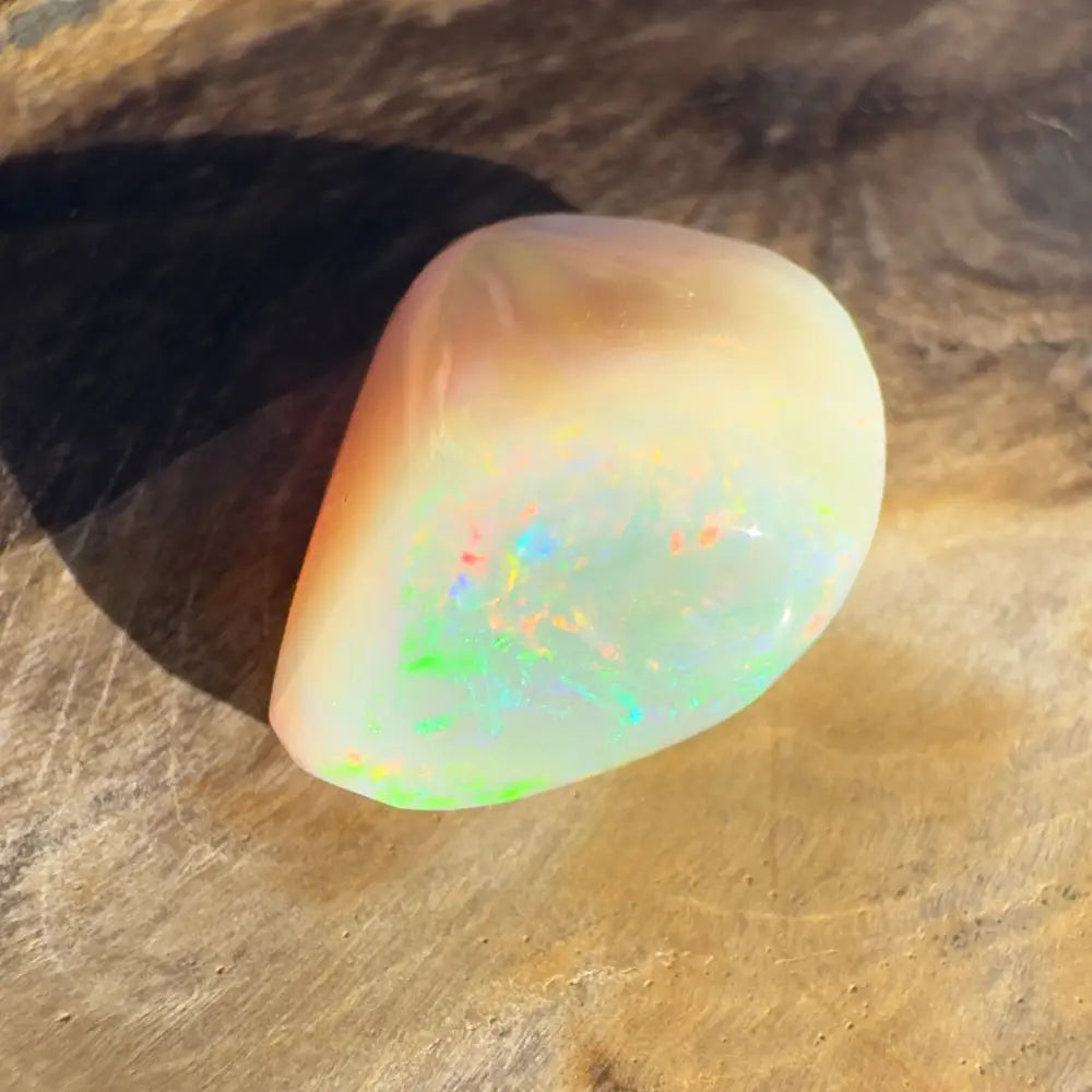 Iridescent Lightning Ridge Opal gemstone in a hand-cut 4.1 carat specimen