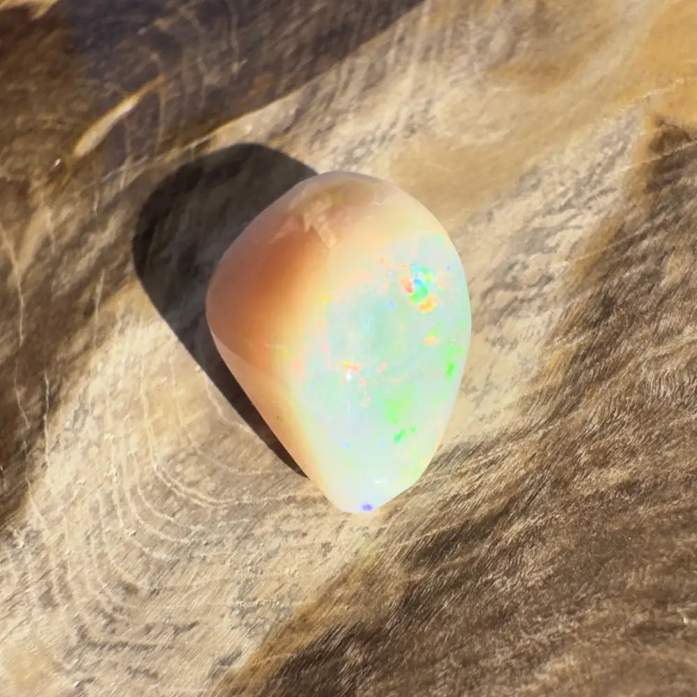 Iridescent Opal gemstone from Lightning Ridge in a 4.1 carat hand-cut solid specimen