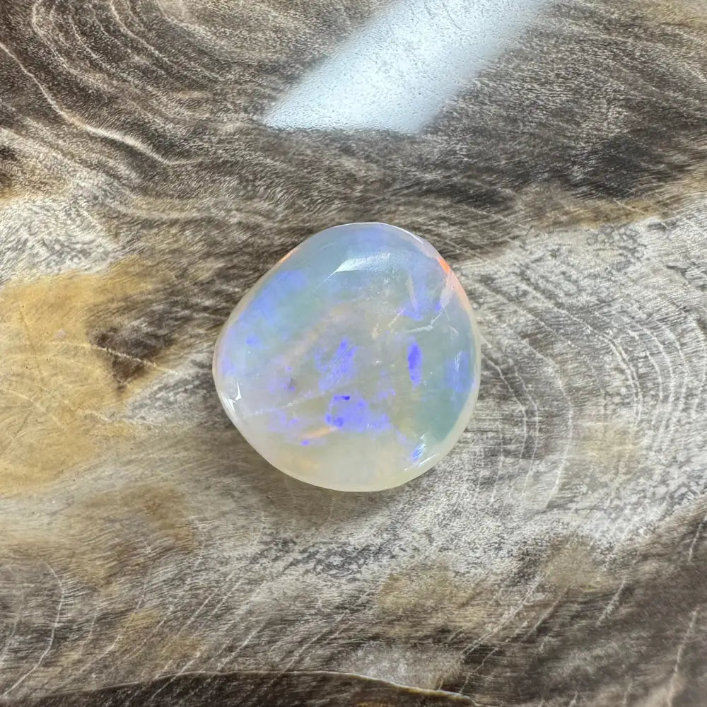 Iridescent Opal Cabochon from Lightning Ridge in a 4.7-carat Hand-Cut Solid Opal
