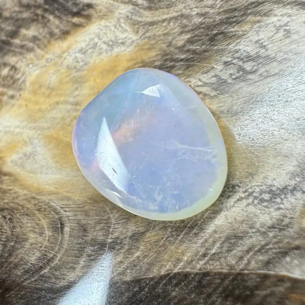 Translucent iridescent polished Lightning Ridge Opal 4.7carat gemstone display