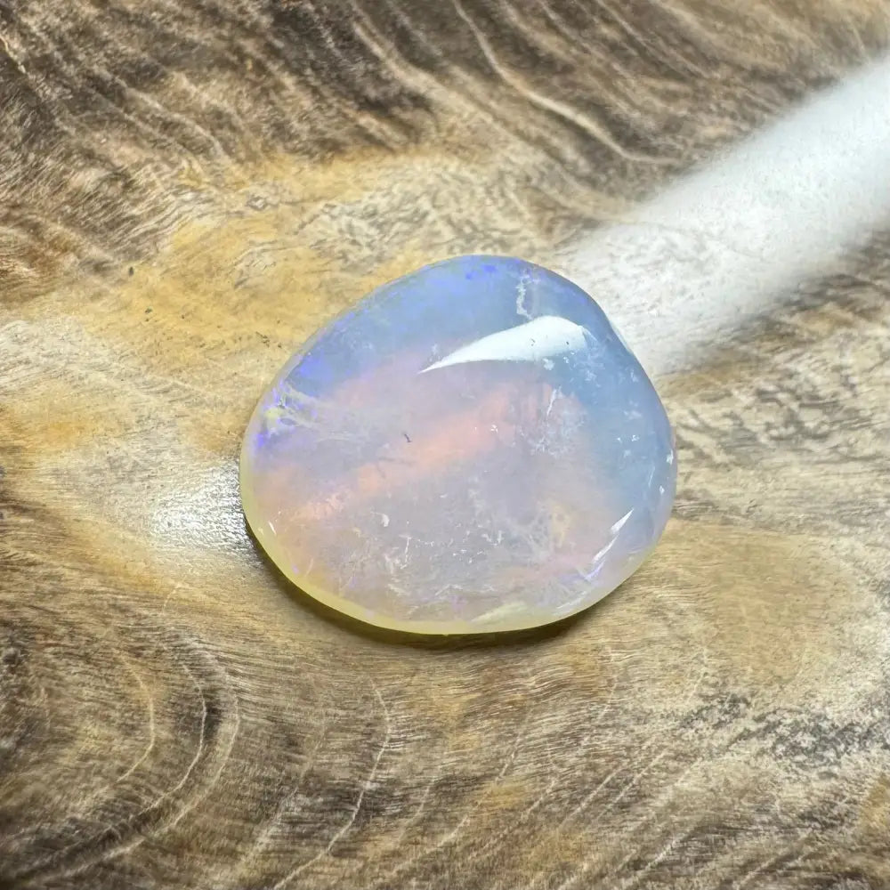Translucent iridescent Lightning Ridge Opal cabochon from the Hand-Cut Solid Opal collection
