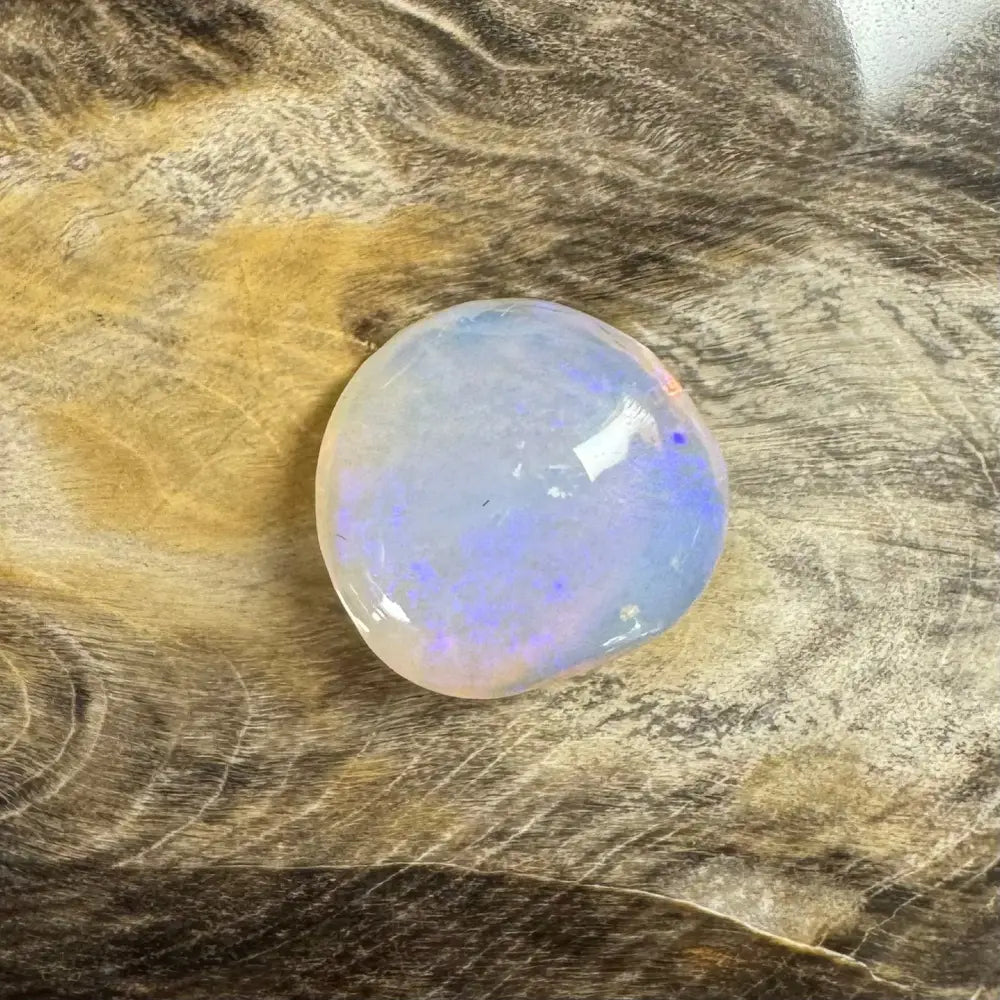 Translucent Lightning Ridge Opal cabochon with iridescent play-of-color for jewelry making