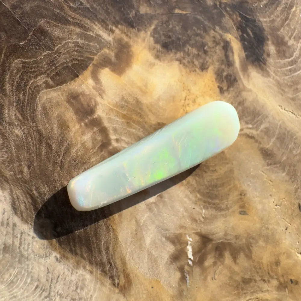 Iridescent elongated opal cabochon from Hand-Cut Solid Lightning Ridge Opal 7.5carat