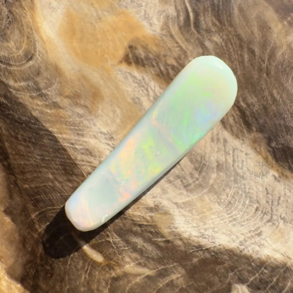 Iridescent white opal cabochon from Hand-Cut Solid Lightning Ridge Opal 7.5 carats