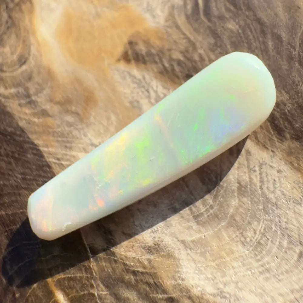 Iridescent white opal cabochon from Hand-Cut Solid Lightning Ridge Opal 7.5 carats