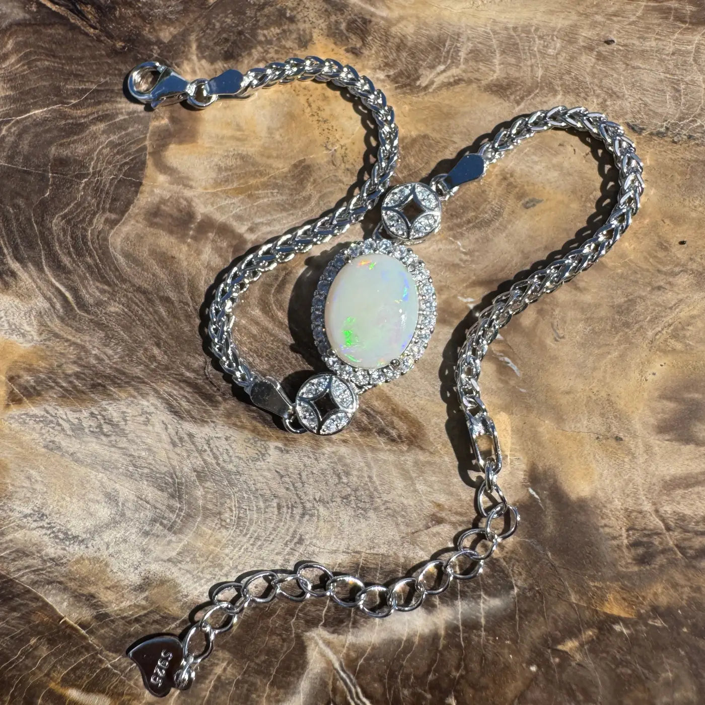 Silver bracelet featuring a 1.1ct Coober Pedy Opal gemstone and cubic zirconia accents