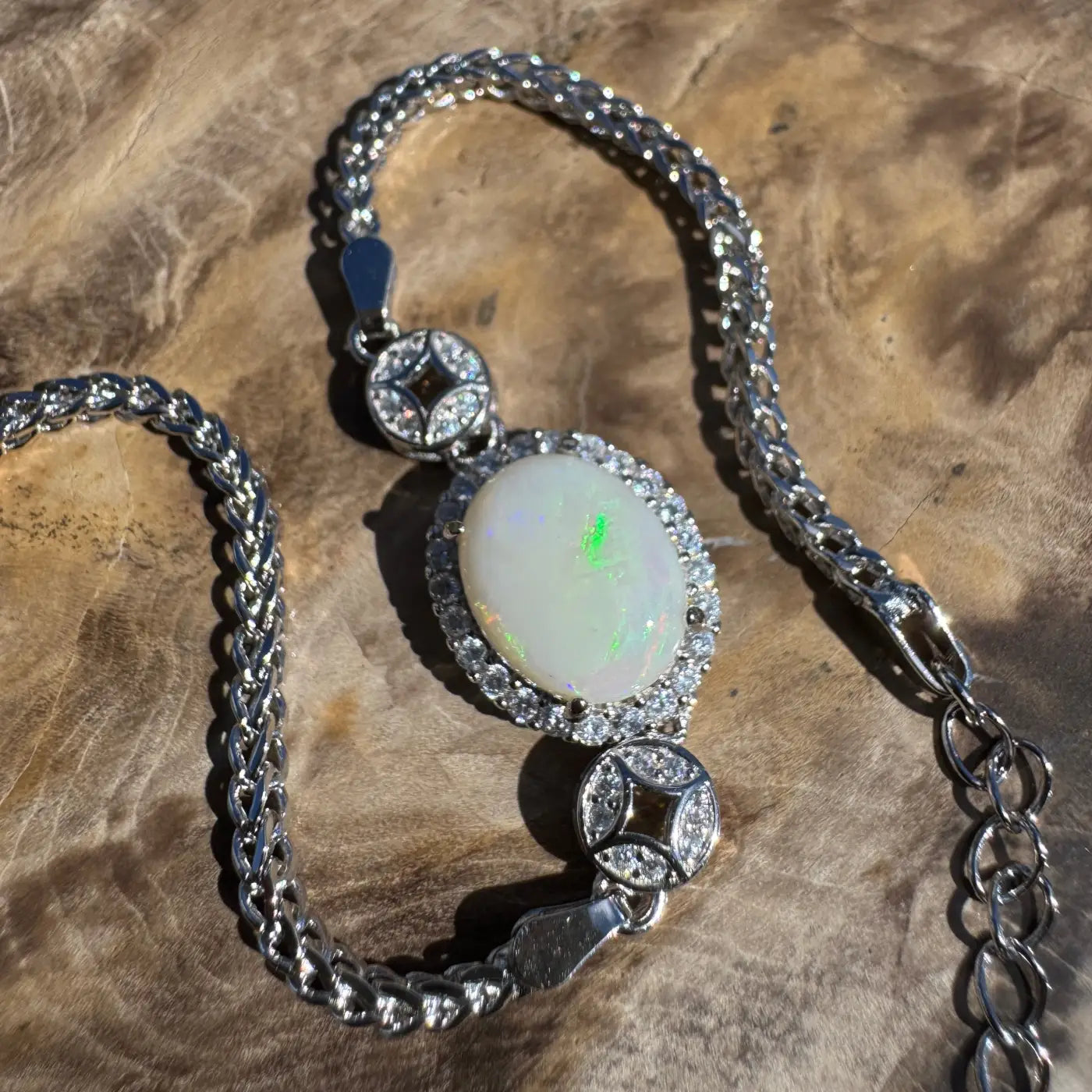 Silver opal bracelet featuring a handcrafted 1.1 carat Coober Pedy opal and cubic zirconia on sterling silver