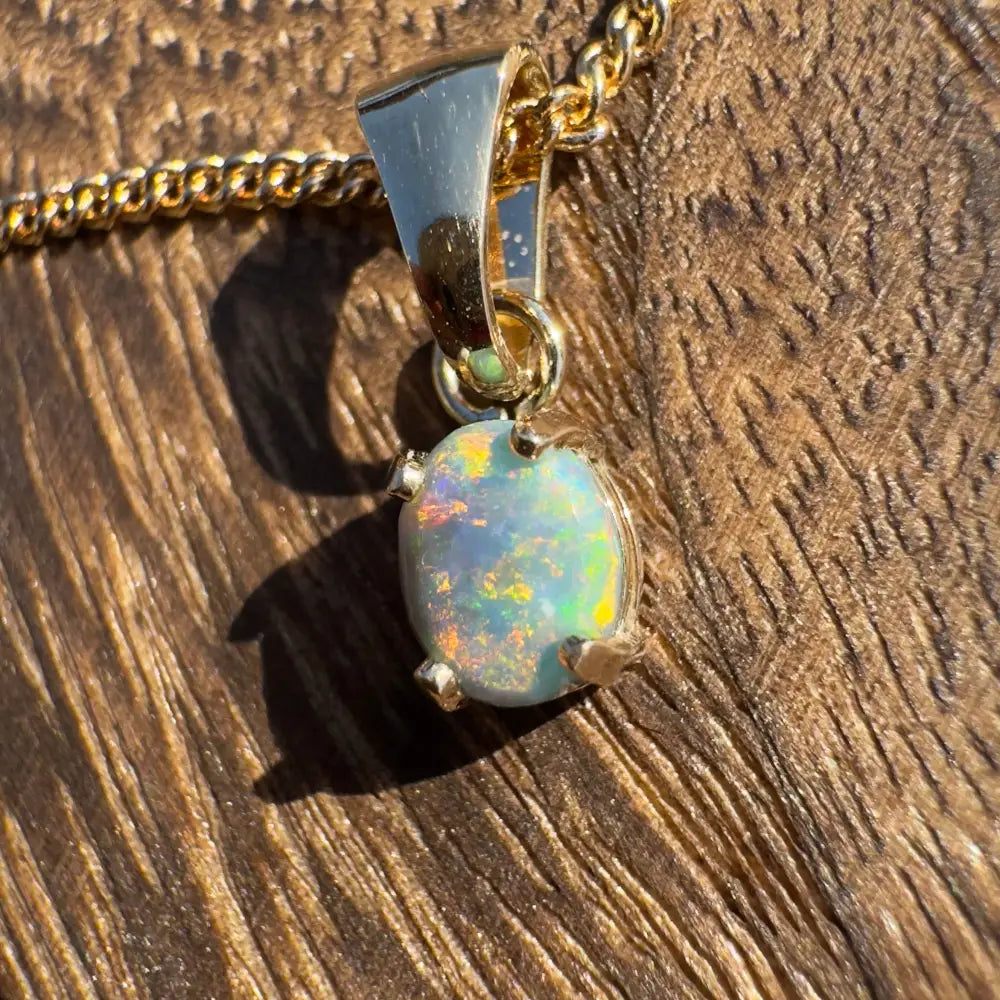Handcrafted 9ct Solid Gold 0.7ct Lightning Ridge Black Opal Pendant