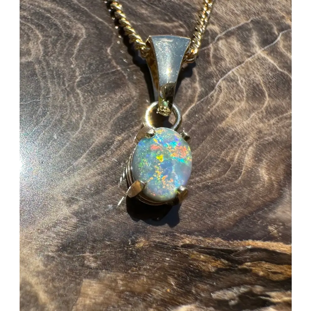 Handcrafted 9ct Solid Gold 0.7ct Lightning Ridge Black Opal Pendant