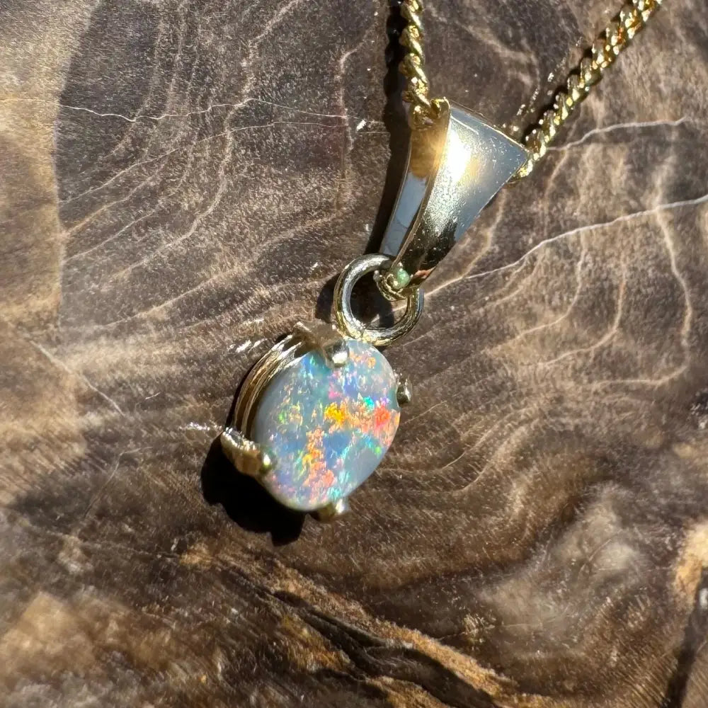 Handcrafted 9ct Solid Gold 0.7ct Lightning Ridge Black Opal Pendant