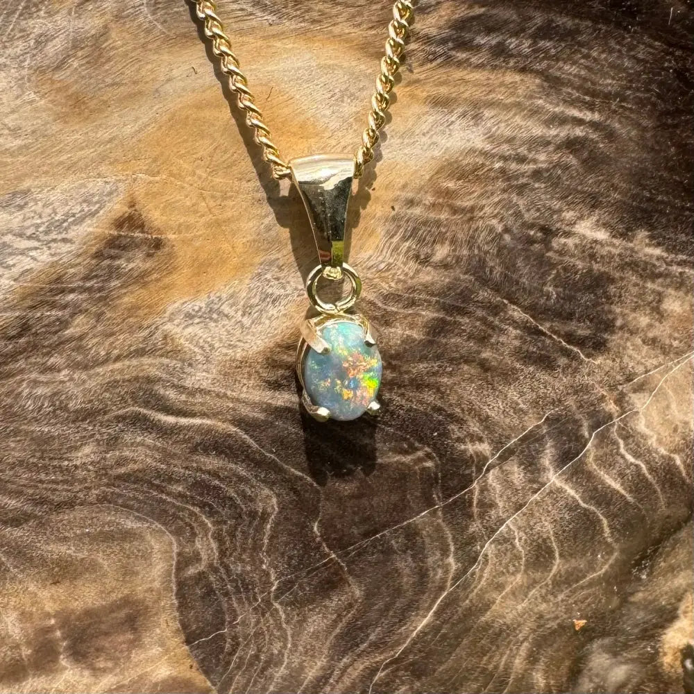 Handcrafted 9ct Solid Gold 0.7ct Lightning Ridge Black Opal Pendant