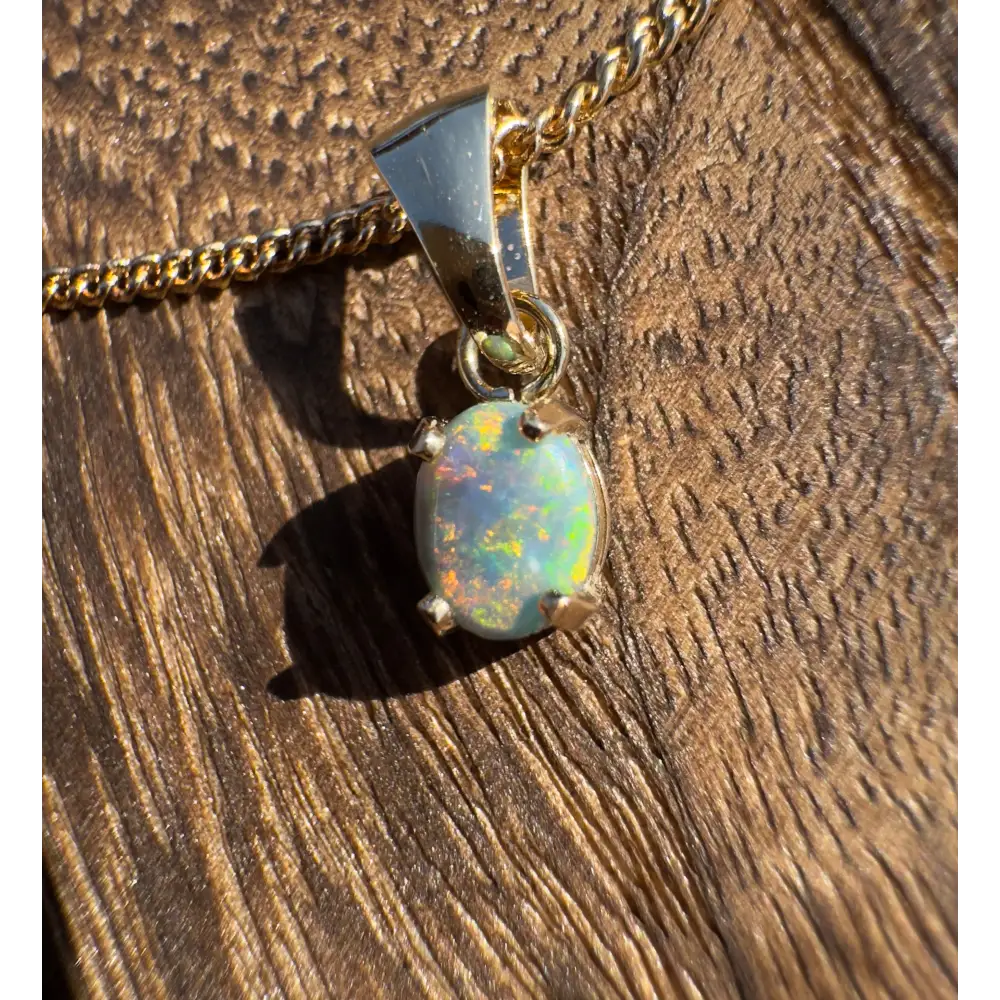 Handcrafted 9ct Solid Gold 0.7ct Lightning Ridge Black Opal Pendant