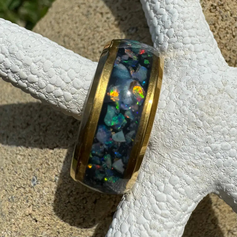 Gold-banded Australian Opal Ring in surgical steel size L displayed prominently