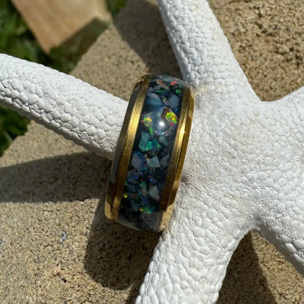 Gold-trimmed Australian opal ring in size L displayed in a handcrafted jewelry product image