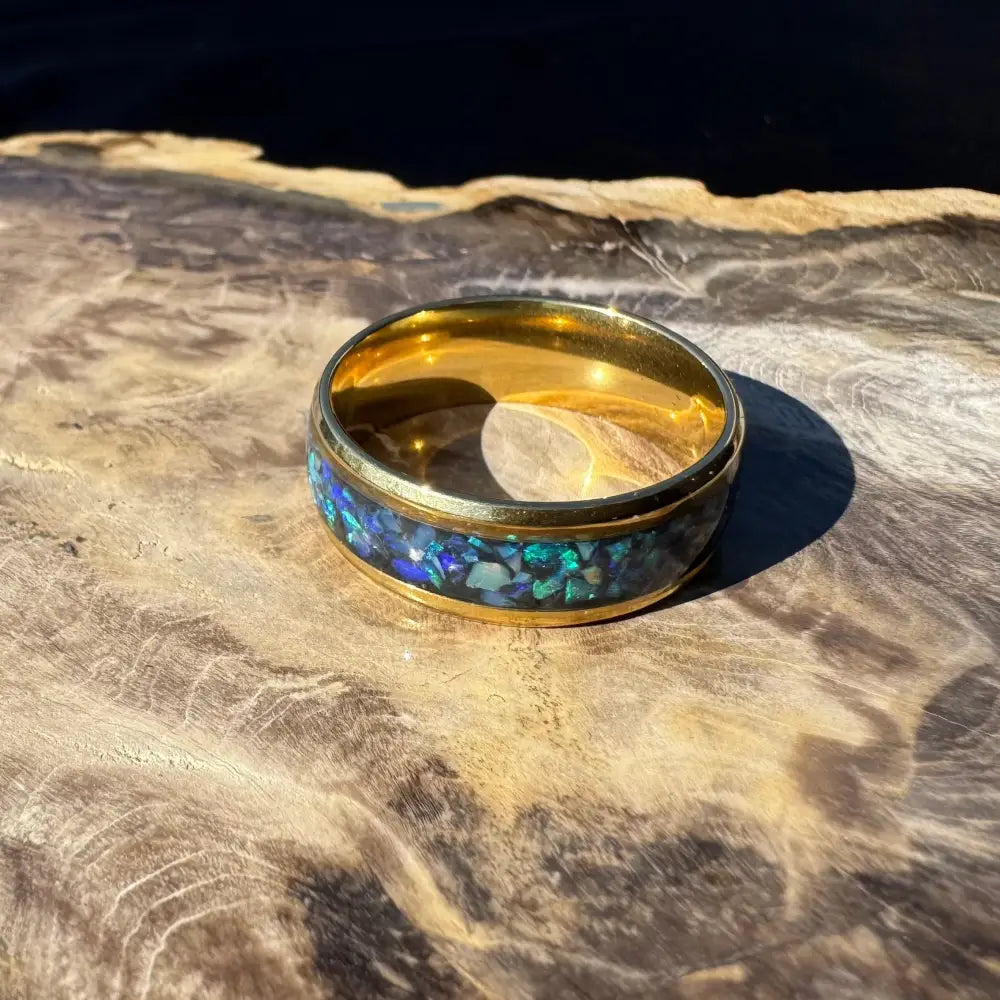 Handcrafted Australian Opal Ring with gold band and blue-green stone inlay in size V