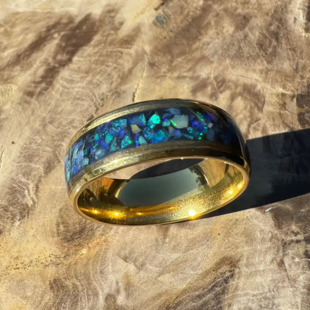 Gold ring with blue opal inlay from Handcrafted Australian Opal Ring Gold Surgical Steel Size V