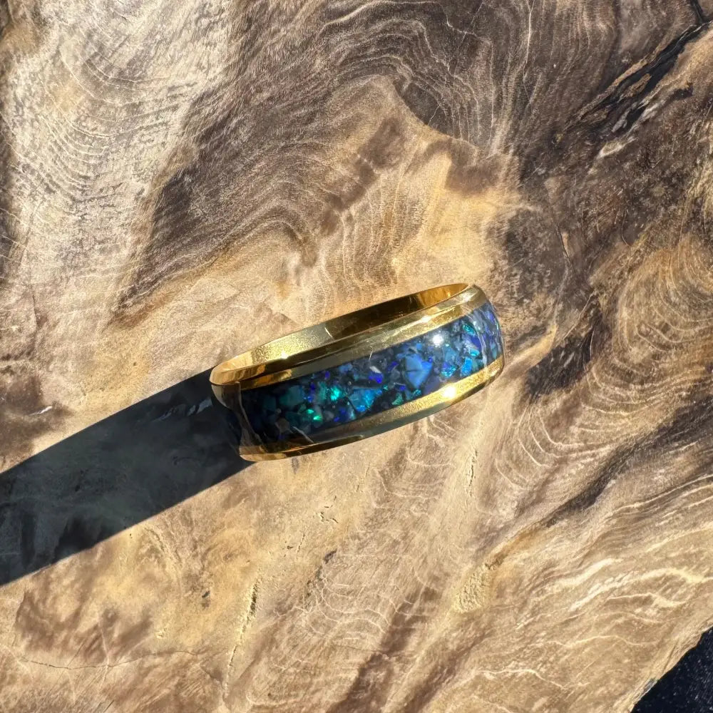 Gold ring with blue opal inlay from Handcrafted Australian Opal Ring collection