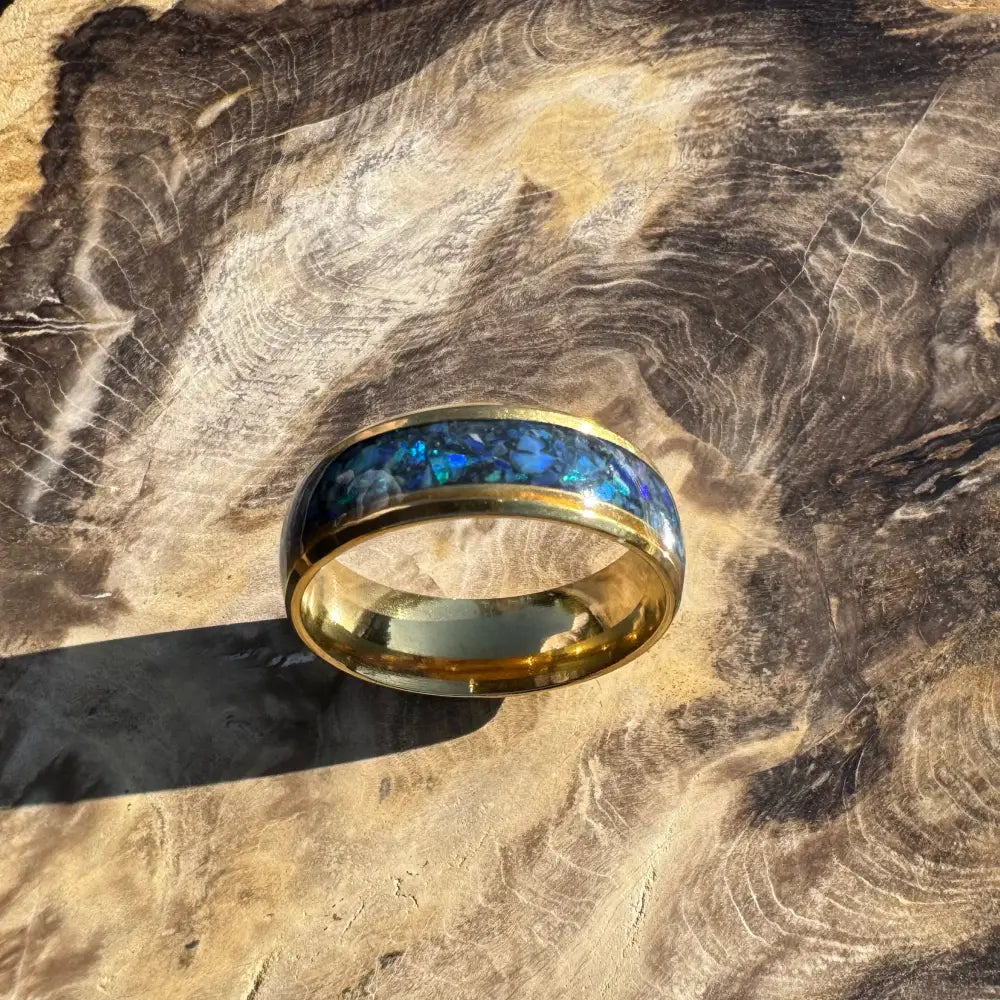 Gold ring with blue opal inlay from Handcrafted Australian Opal Ring Gold Surgical Steel Size X 1/2 (12)